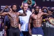 Boxers Errol Spence Jr. and Terence Crawford pose as they come together following their weigh-i ...