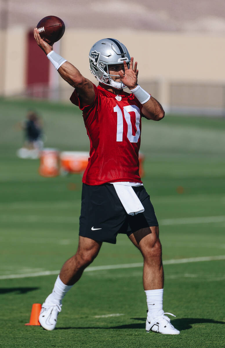 Raiders quarterback Jimmy Garoppolo throws the ball during training camp at the Intermountain H ...