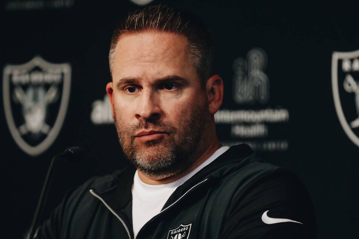 Raiders head football coach Josh McDaniels speaks to the media during training camp at the Inte ...