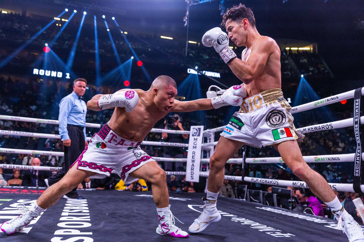 Isaac Cruz catches Giovanni Cabrera in the gut in round 1 during world welterweight, WBC Silver ...