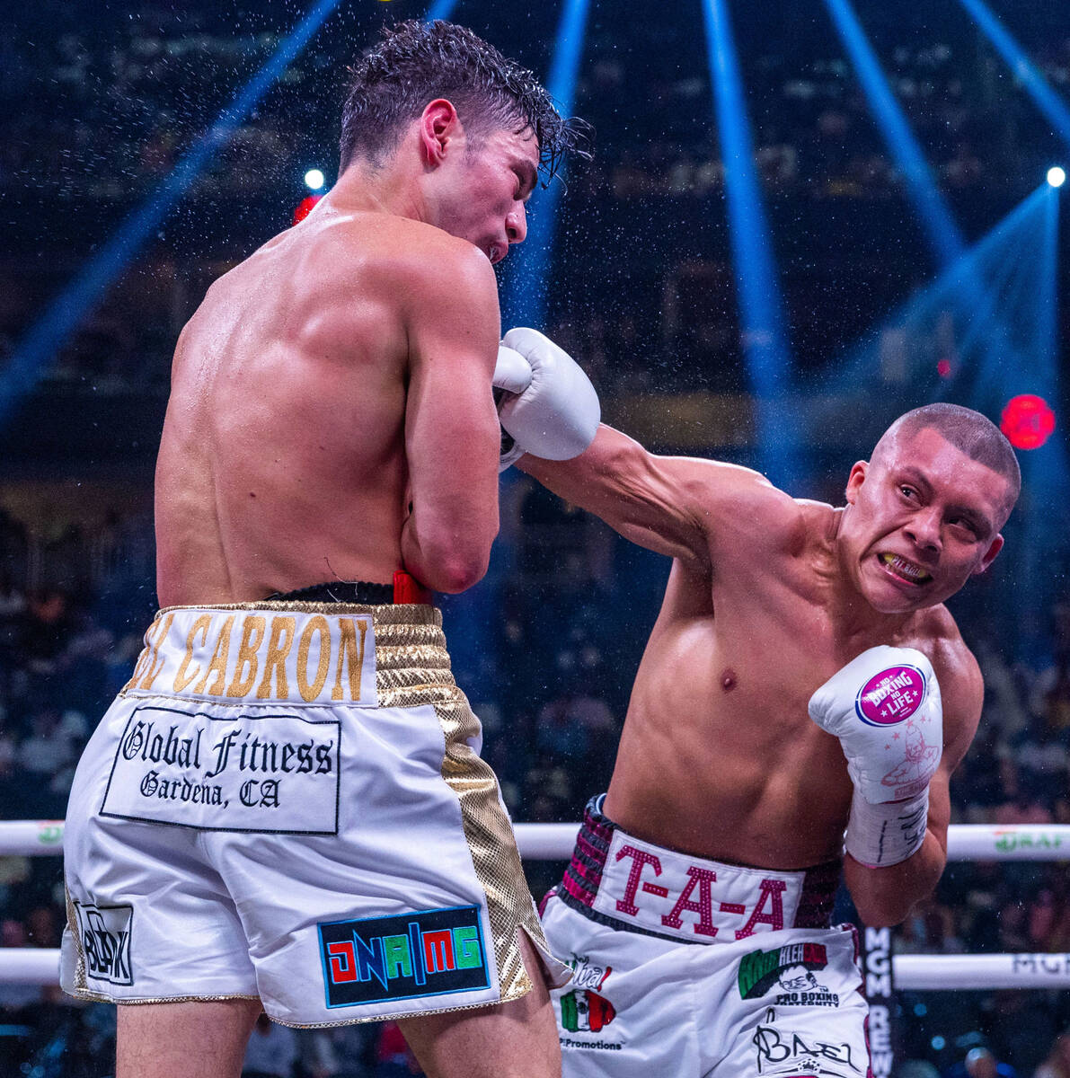 Giovanni Cabrera takes another punch from Isaac Cruz in round 10 during world welterweight, WBC ...