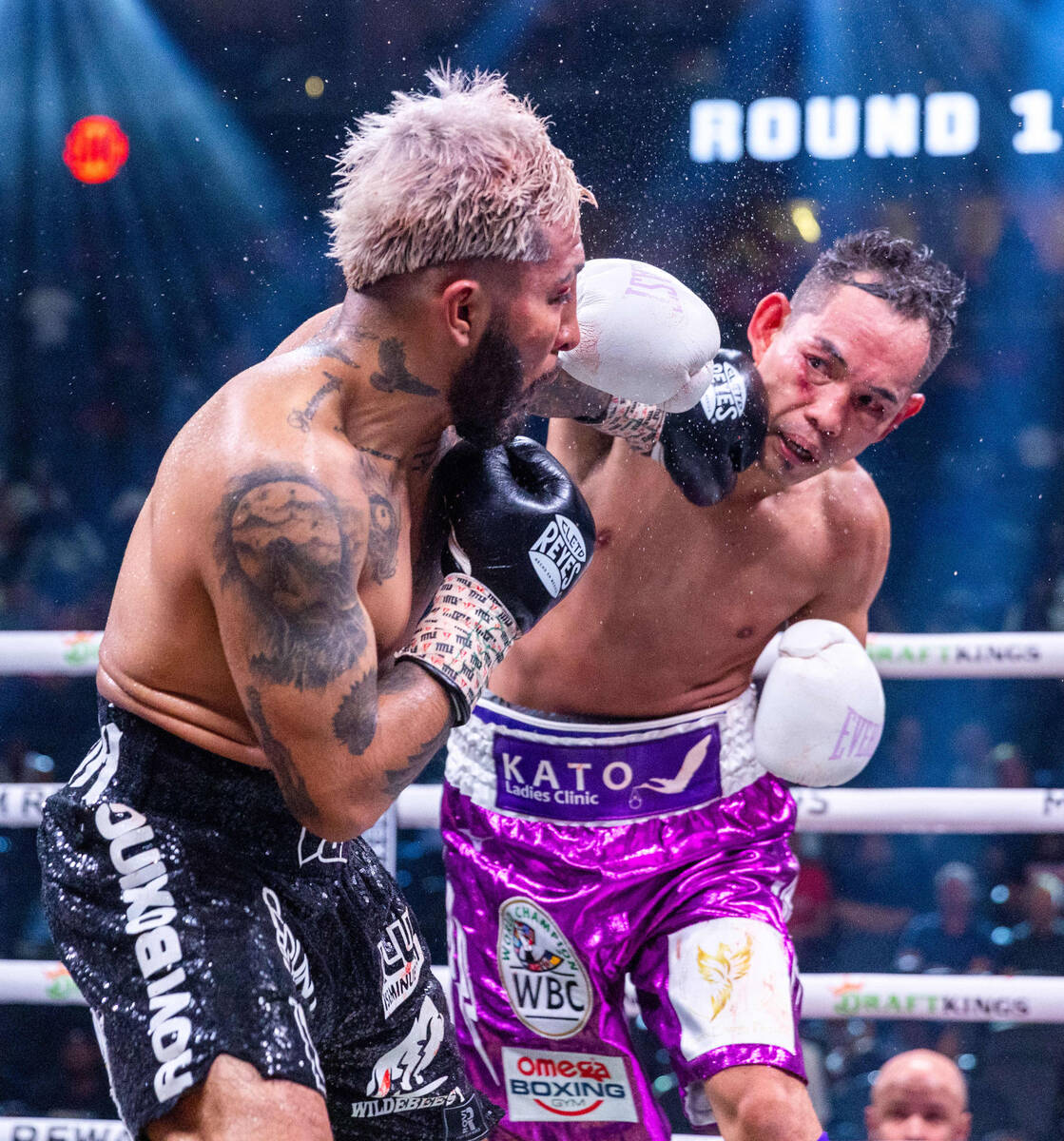 Alexandro Santiago and Nonito Donaire trade punches in round 10 during a WBC world bantamweight ...