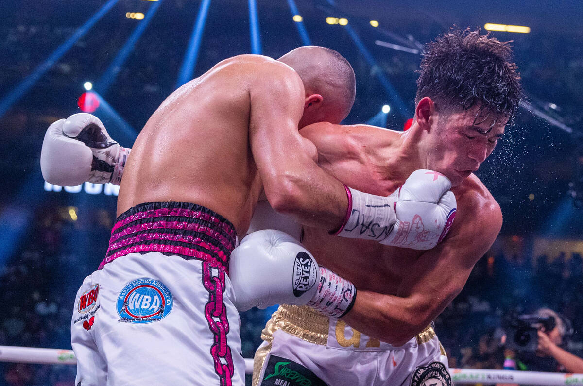 Isaac Cruz connects with the chin of Giovanni Cabrera in round 7 during world welterweight, WBC ...