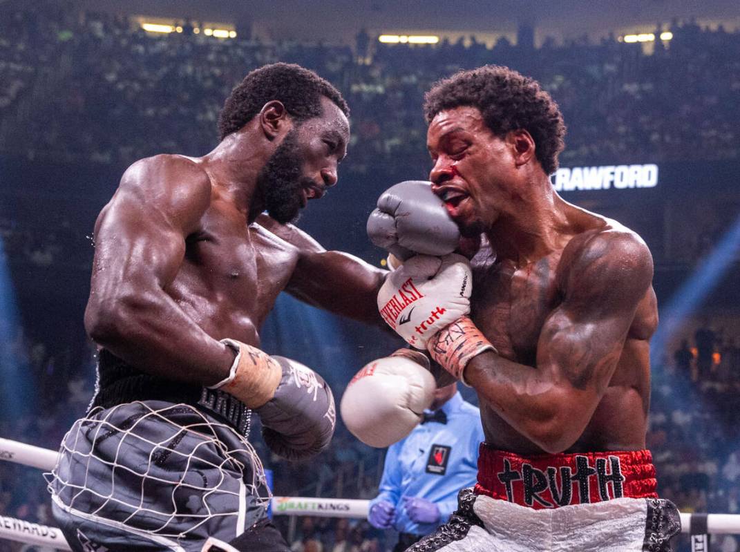 Terence Crawford strikes Errol Spence Jr., in the face in round 6 during an undisputed world we ...