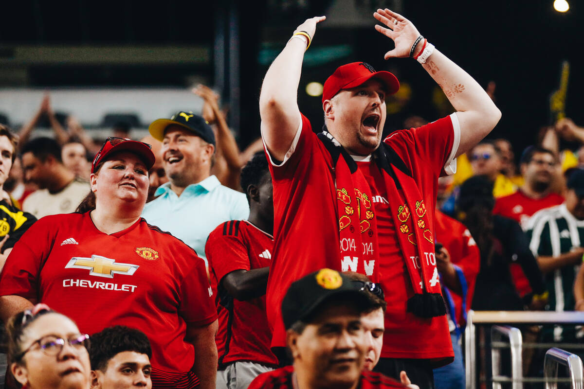 A Manchester United fan screams in frustration as his team trails Borussia Dortmund at Allegian ...