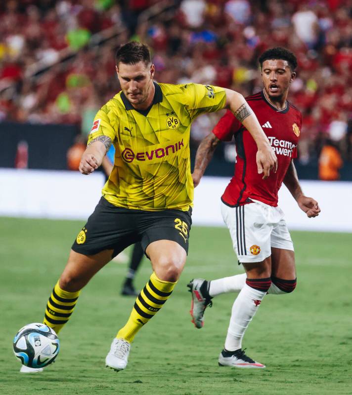 Borussia Dortmund defender Niklas Sule (25) kicks the ball during a match up against Manchester ...