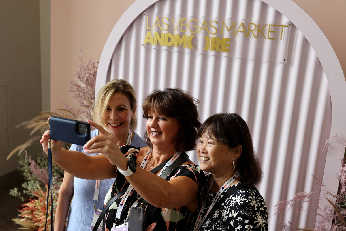Isabelle Alpert, from left, Linda Lawrence, and Patti Mu, all of Thousand Oaks, Calif., take a ...