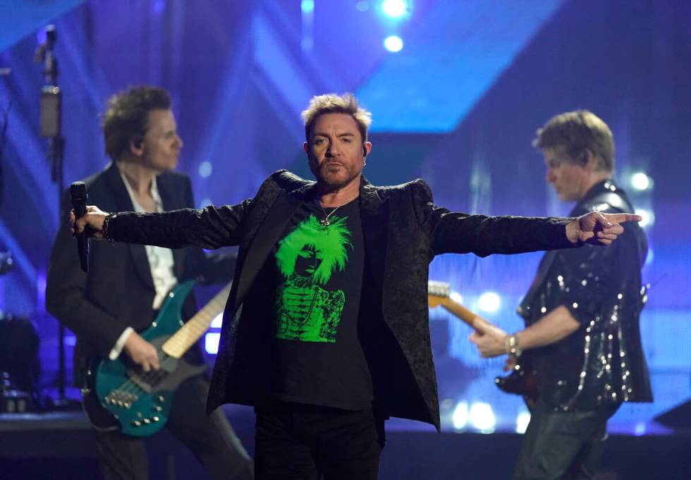 Inductees John Taylor, from left, Simon Le Bon, and Roger Taylor of Duran Duran perform during ...