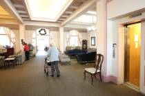 Bret Harte Retirement Inn residents make their way down to the dining room for lunch on May 6, ...