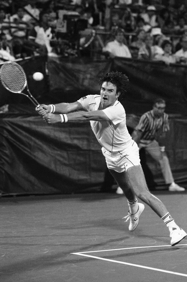 Jimmy Connors leaps to make a return during his fourth-round match with Heinz Gunthardt of Swit ...