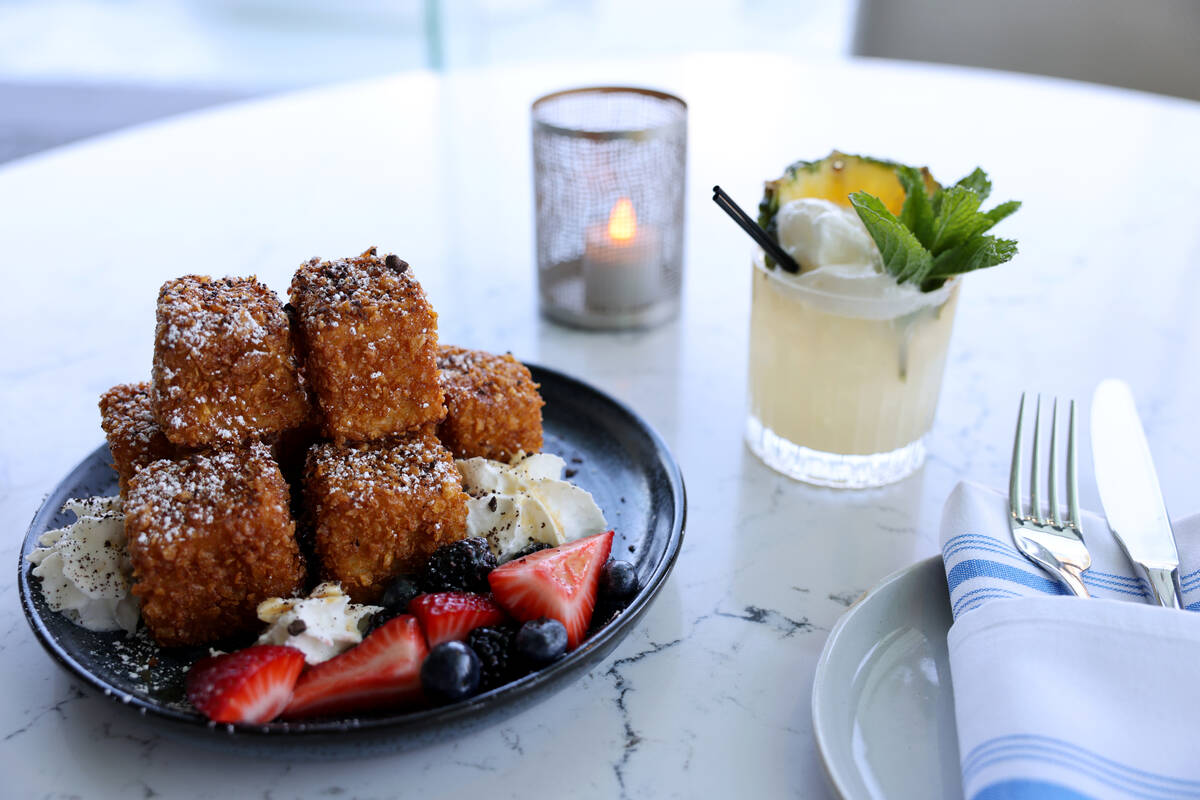 Challah French Toast and an On Island Time signature cocktail at Laguna Pool House & Kitche ...