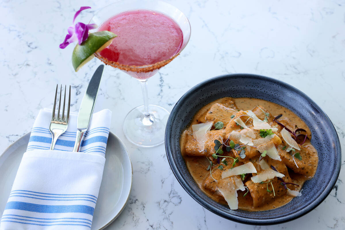 Paccheri alla Vodka pasta and Put the Lime in the Watermelon cocktail are shown at Laguna Pool ...