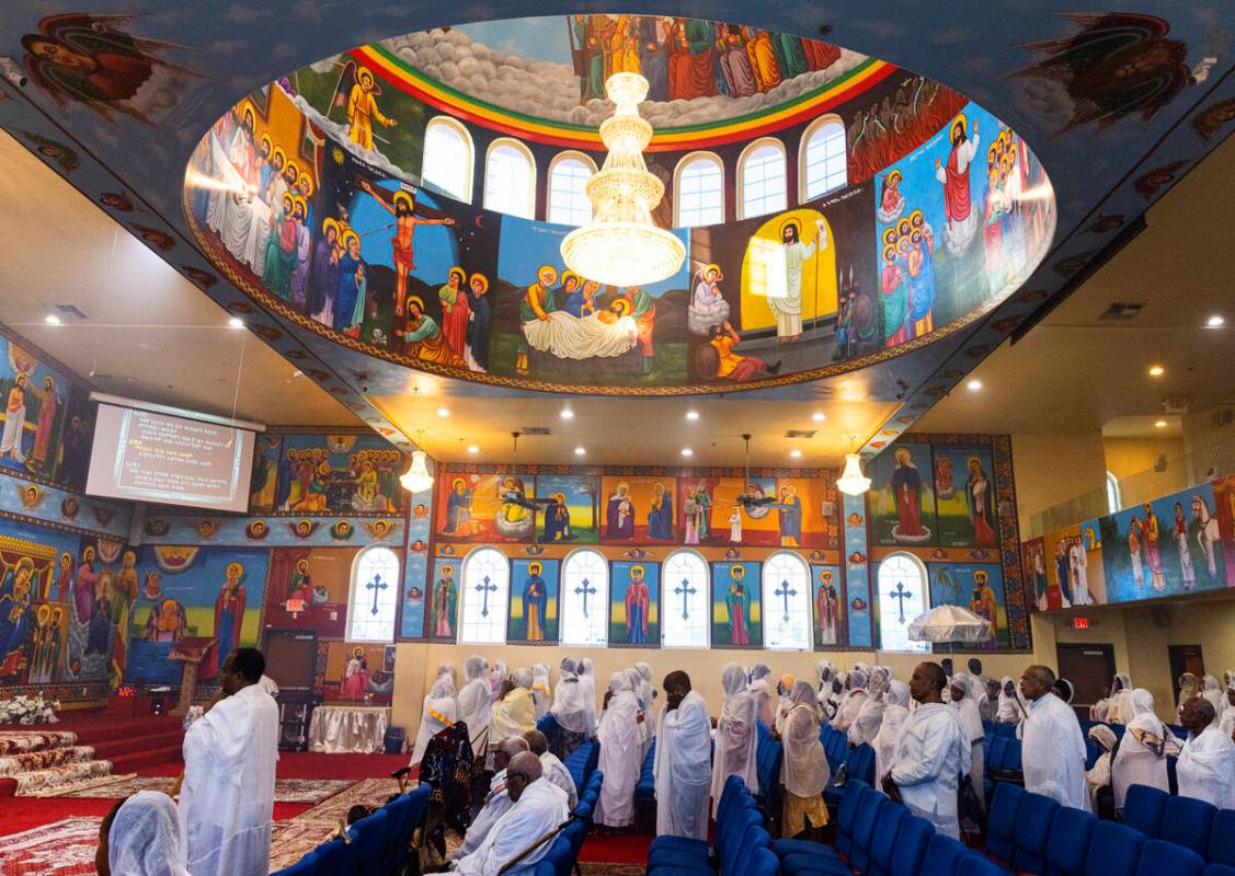 Worshippers pray during mass at Hamere Noah Kidane Mehret and St Michael Ethiopian Orthodox Tew ...