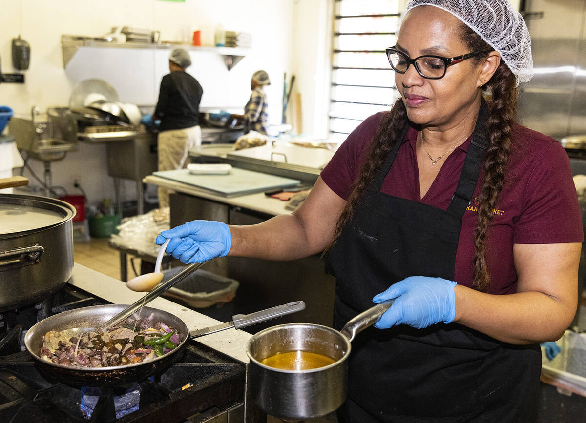 Eleni Belete, Melkam Ethiopian Market co-owner and head chef, prepares Lega Tibs at her store a ...