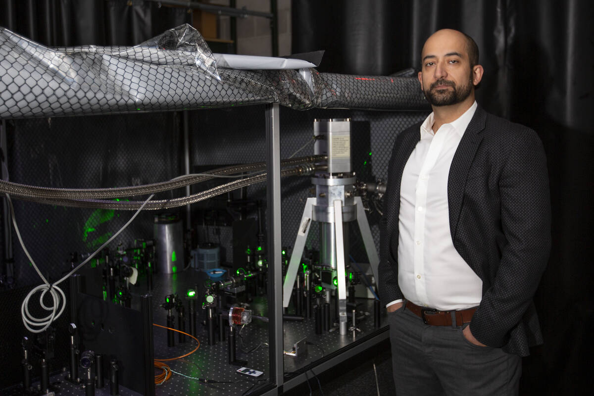 Ashkan Salamat, assistant professor of physics and astronomy at UNLV, poses for a portrait in h ...