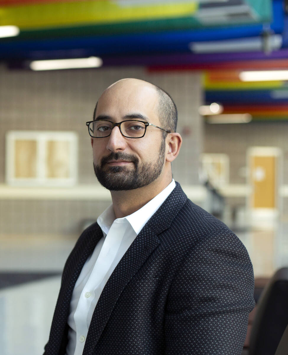 Ashkan Salamat, assistant professor of physics and astronomy at UNLV, poses for a portrait outs ...