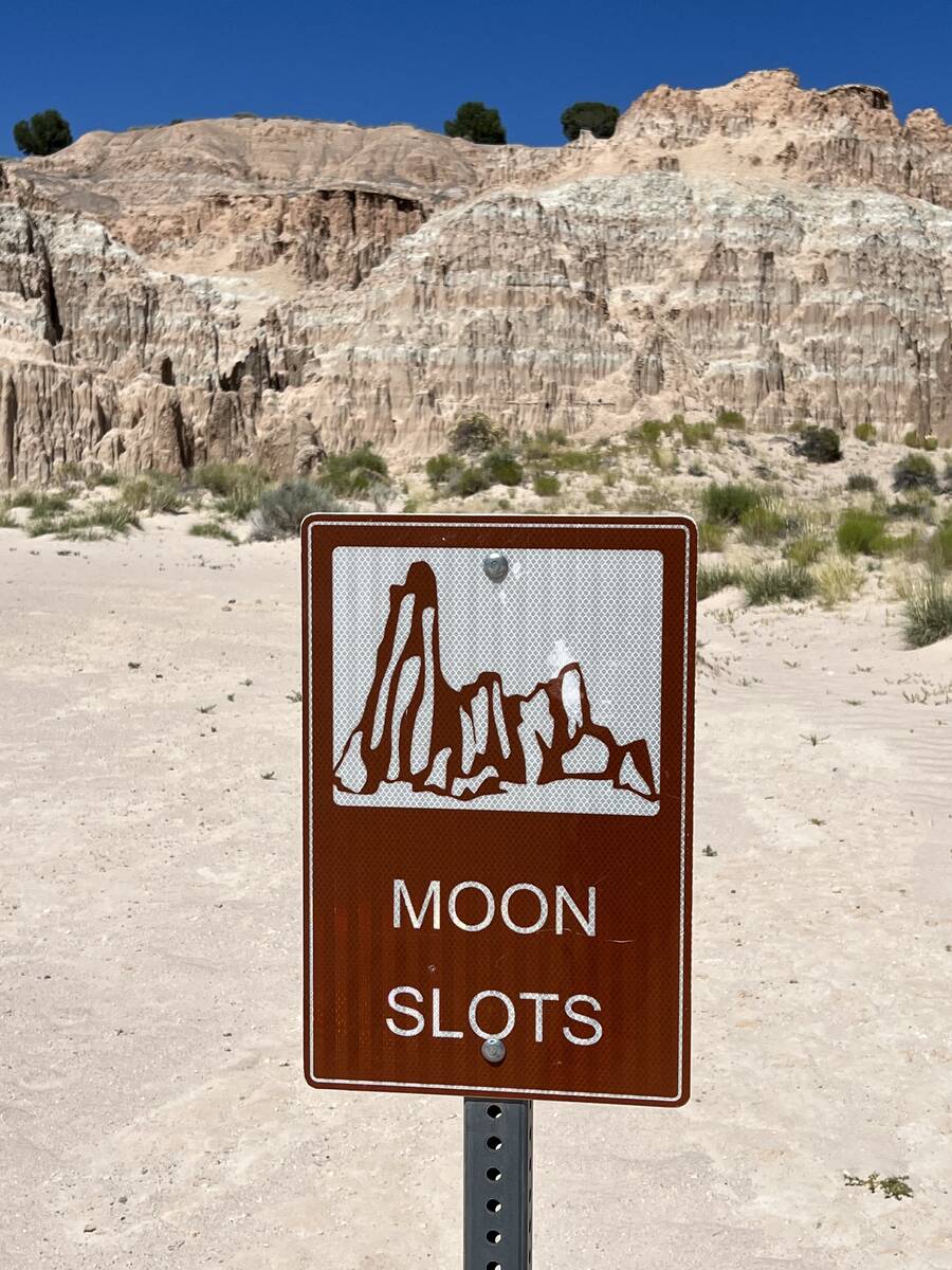 A sign marks the Moon Caves slot canyons on July 8, 2023, in Cathedral Gorge State Park. (Carri ...