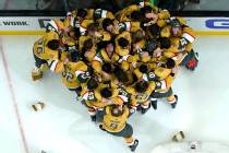 Members of the Vegas Golden Knights celebrate after they defeated the Florida Panthers 9-3 to w ...