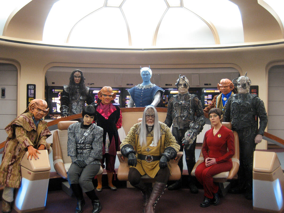 Some of the more than 100 costumed characters are shown inside "Star Trek: The Experience." (Re ...
