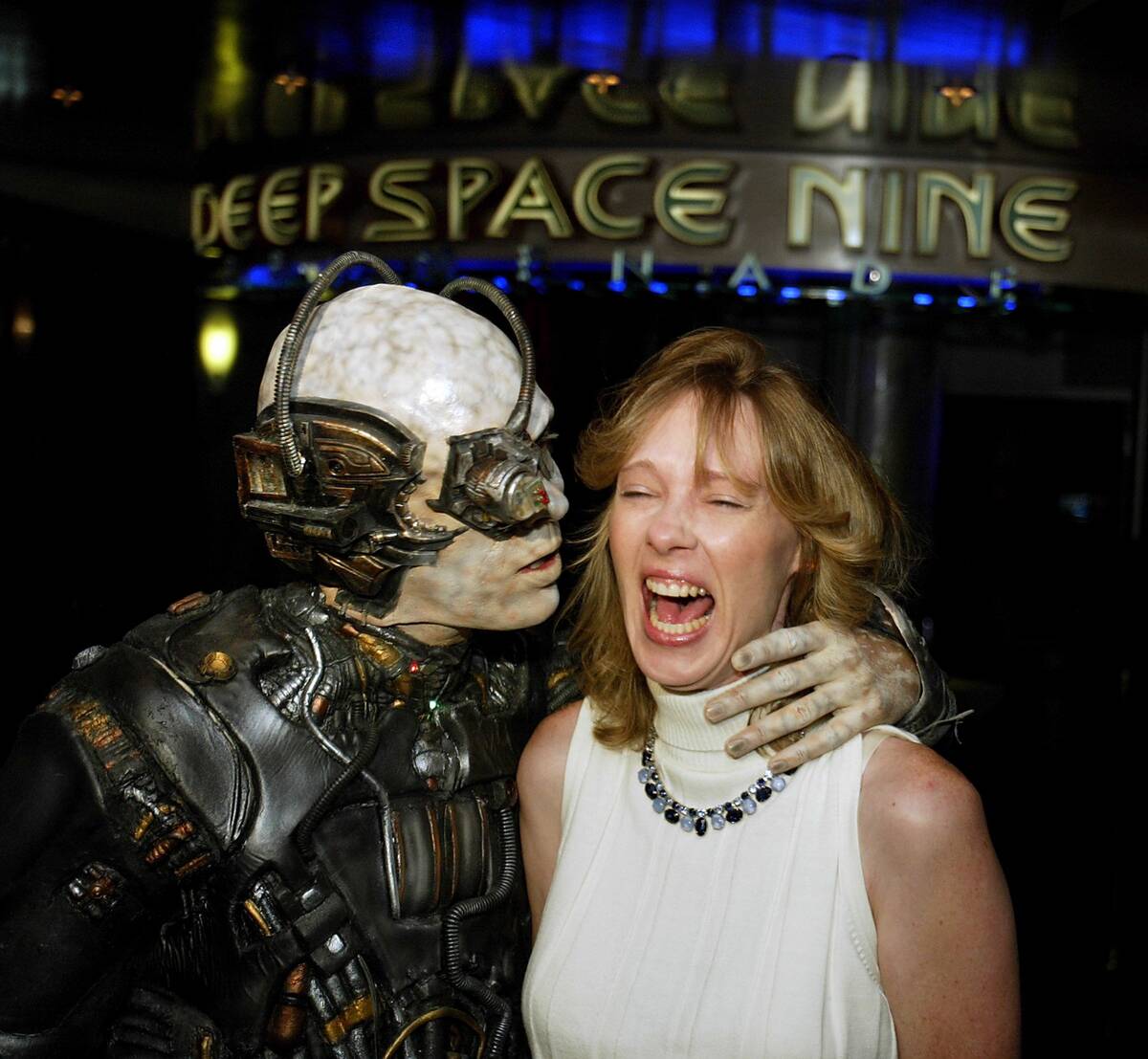 Jannice Livingston of Norwich, Connecticut, is approached by a Borg during a press conference a ...