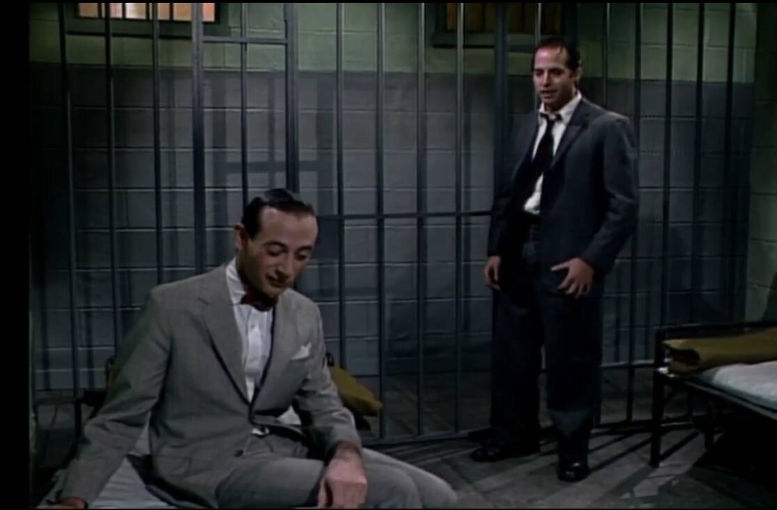 A screen grab of Paul Reubens as Pee-wee Herman and Jon Lovitz as Tommy Flanagan "Saturday Nigh ...