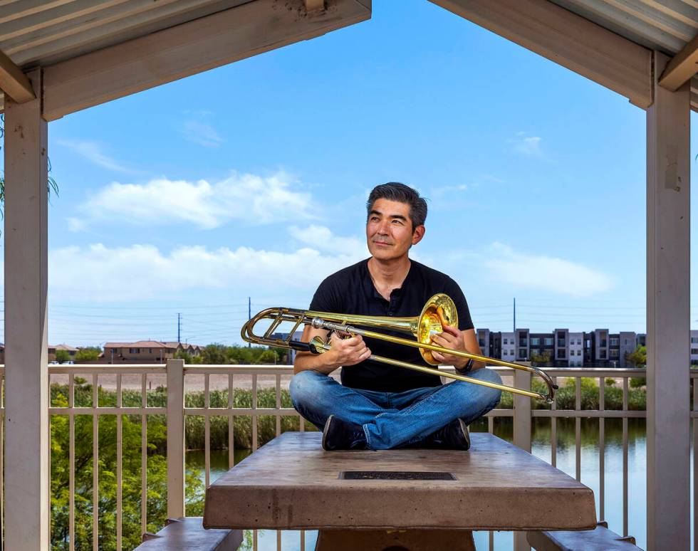 Nathan Tanouye is a trombonist with the Las Vegas Philharmonic at Cornerstone Park on Thursday, ...