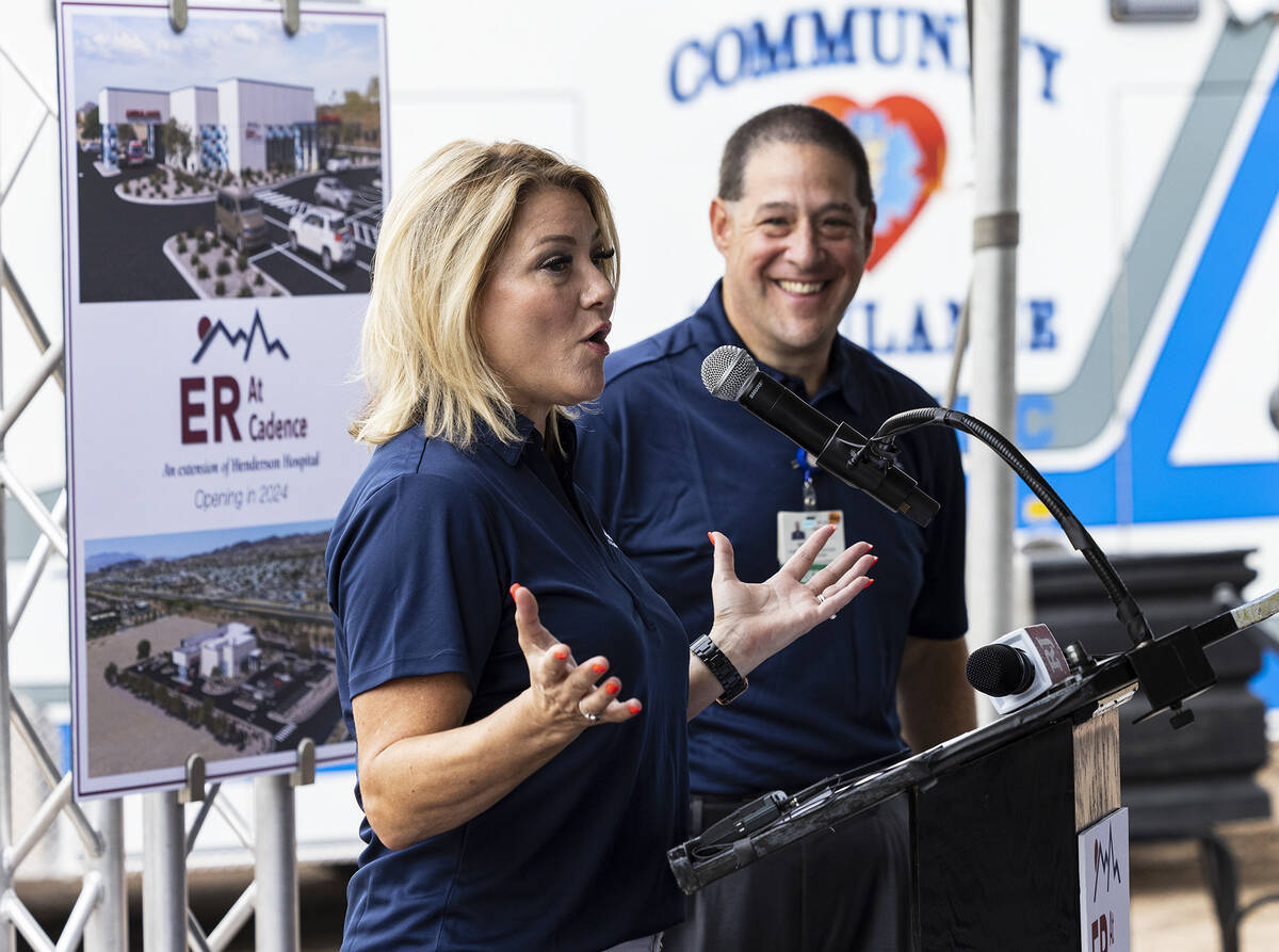 City of Henderson Mayor Michelle Romero speaks as Sam Kaufman, CEO of Henderson Hospital, looks ...