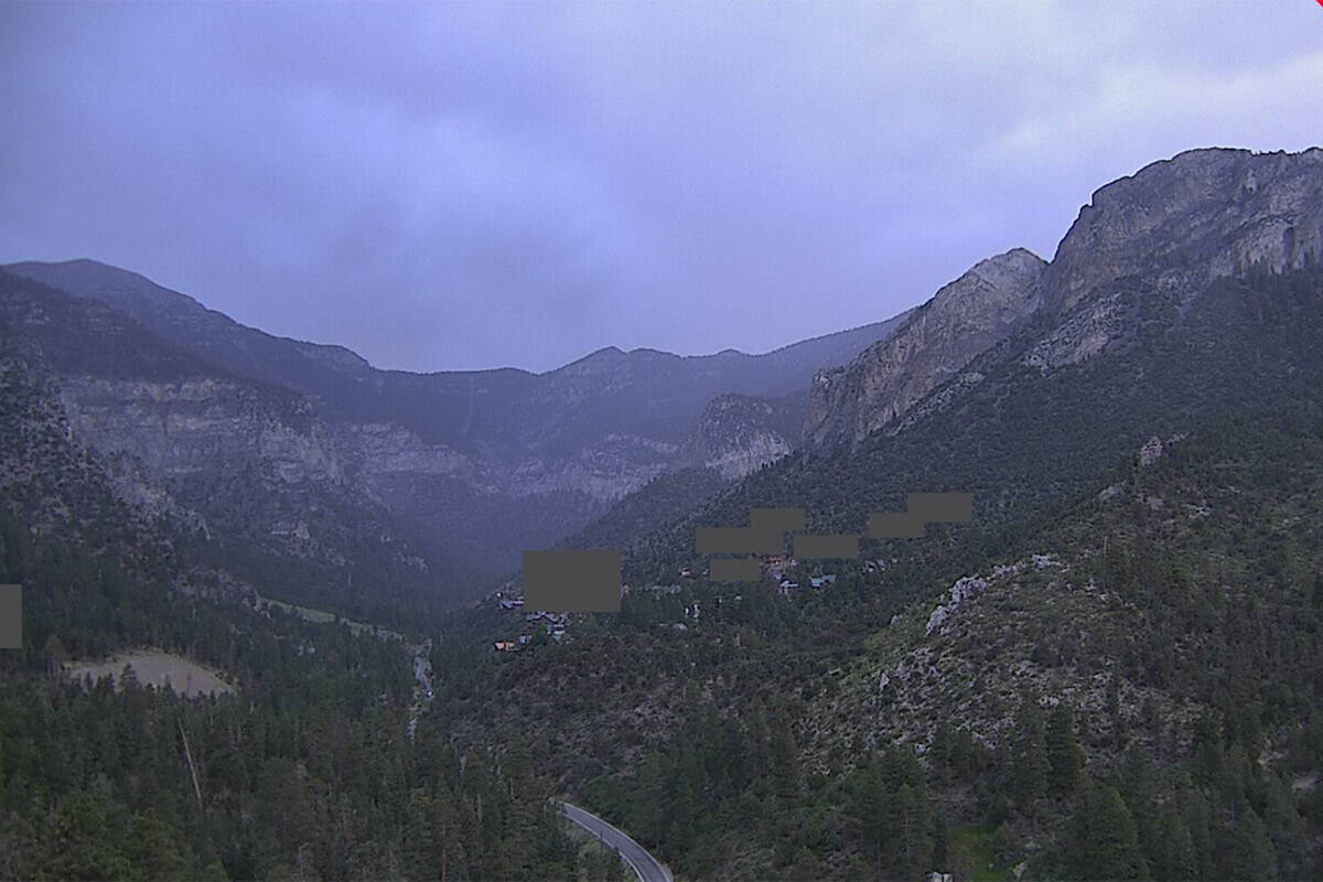 Heavy storm clouds linger over Mt. Charleston around 7:30 p.m. on Tuesday, Aug. 1, 2023. (NV En ...