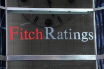 This photo shows signage for Fitch Ratings, Sunday, Oct. 9, 2011, in New York. On Tuesday, Aug. ...