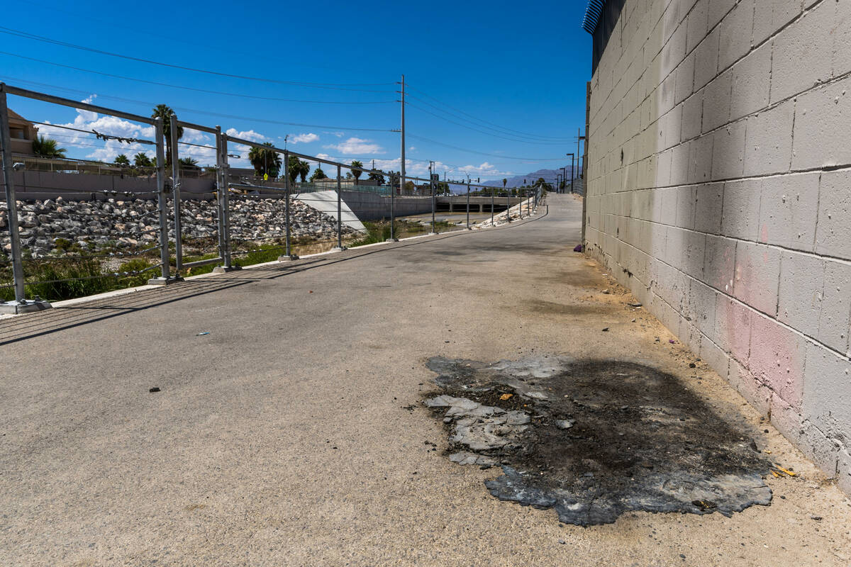 A blackened area on the pavement near where Angel Naranjo recently died from injuries to his ne ...