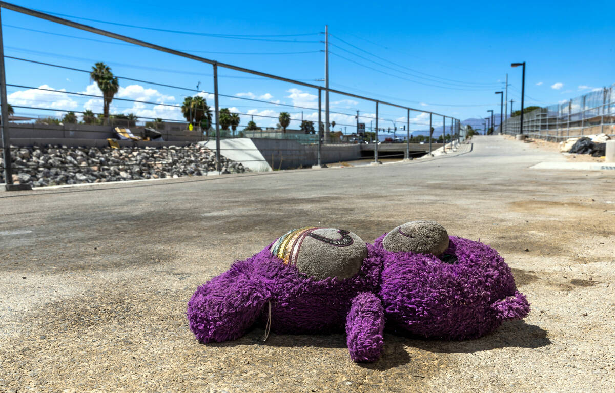 A teddy bear on the pavement near where Angel Naranjo recently died from injuries to his neck w ...