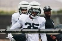 Raiders running back Zamir White gets ready to run through a drill during training camp at the ...
