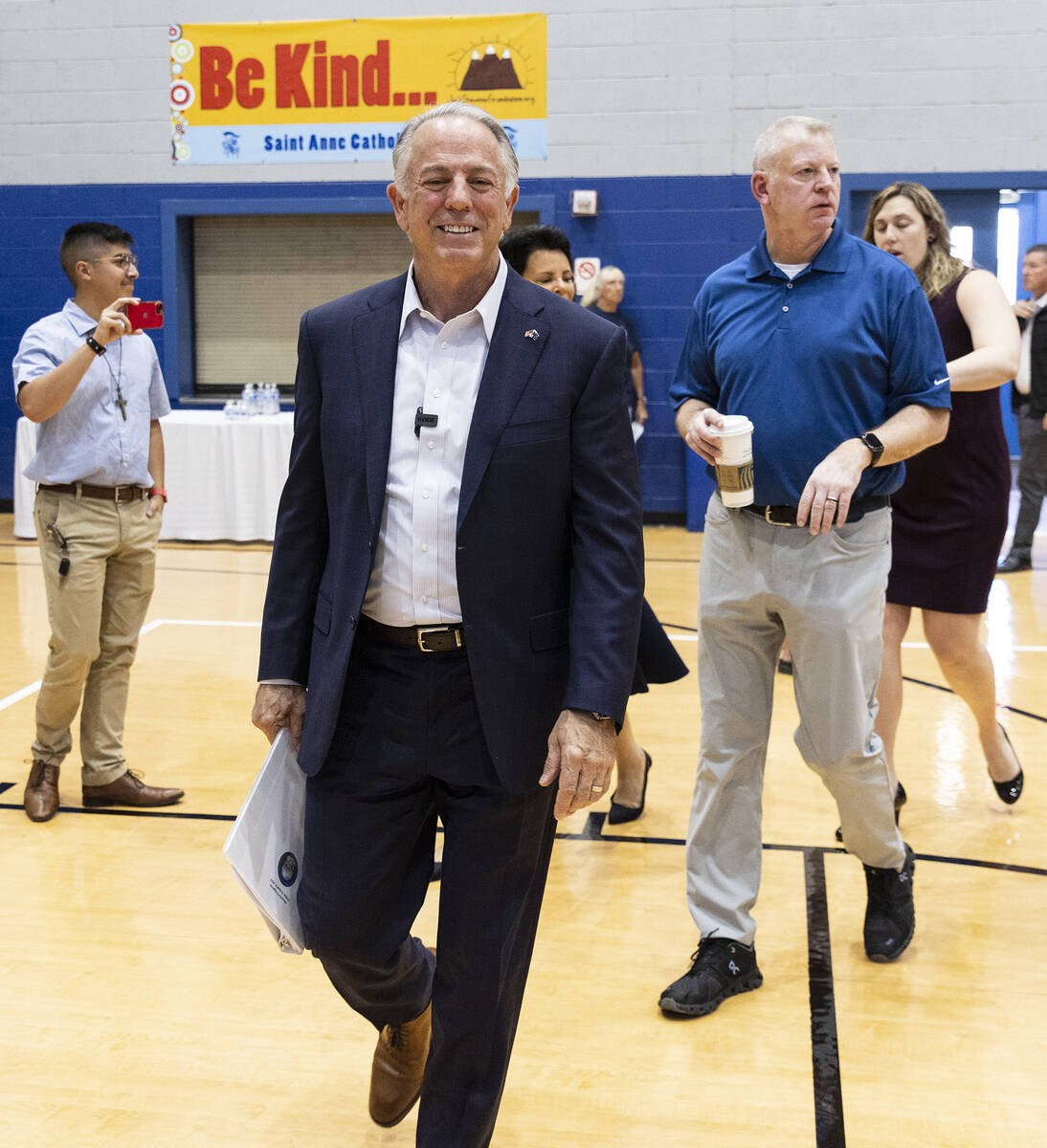 Gov. Joe Lombardo arrives at Saint Anne Catholic School to speak during a "school choice" rally ...