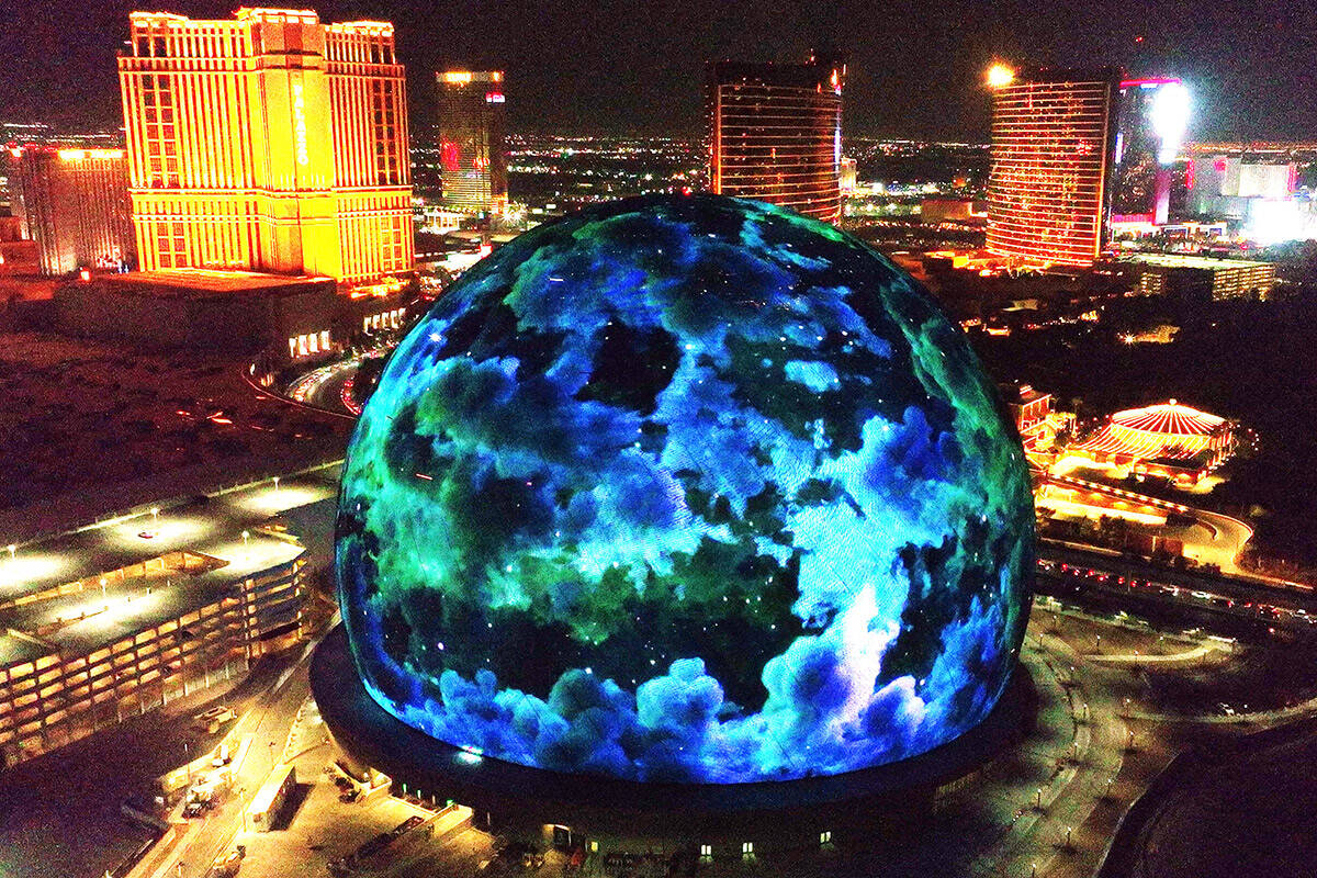 The Sphere illuminates the Las Vegas skyline, on Monday, July 31, 2023, in Las Vegas. (Bizuayeh ...