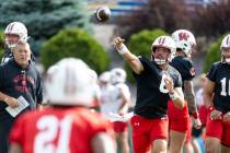 Wisconsin NCAA college football quarterback Tanner Mordecai (8) throws a pass on the first day ...