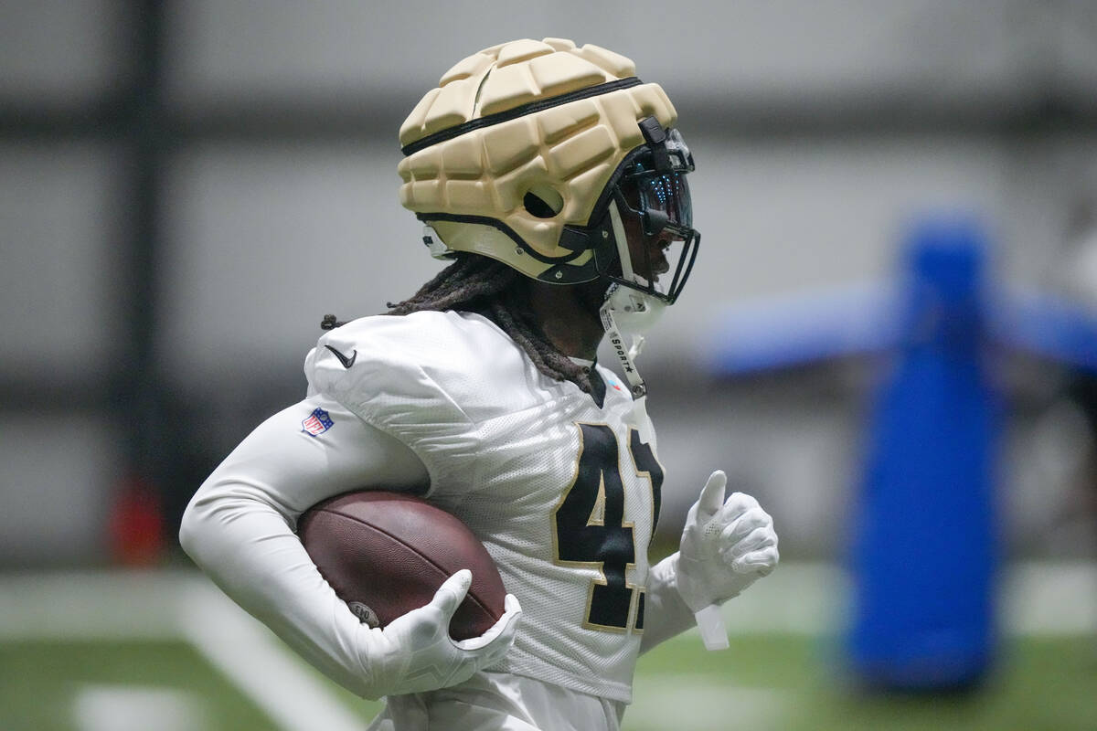 New Orleans Saints running back Alvin Kamara runs through drills at the NFL team's football tra ...