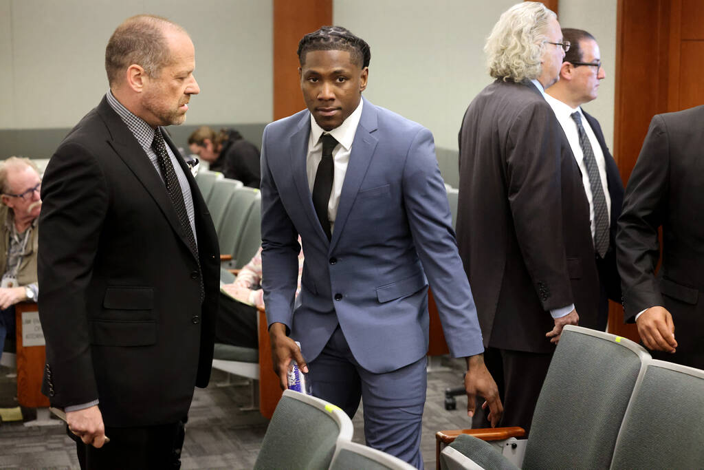 Cincinnati Bengals cornerback Chris Lammons arrives in court with his attorney Ross Goodman fo ...