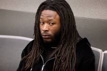 New Orleans Saints running back Alvin Kamara waits in court for arraignment at the Regional Jus ...