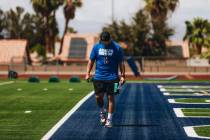 Green Valley head football coach Clay Mauro walks down the field during practice at Green Valle ...