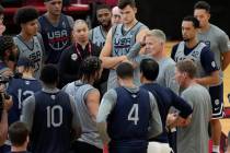 Head coach Steve Kerr of the Golden State Warriors motions as he speaks with his players at a p ...