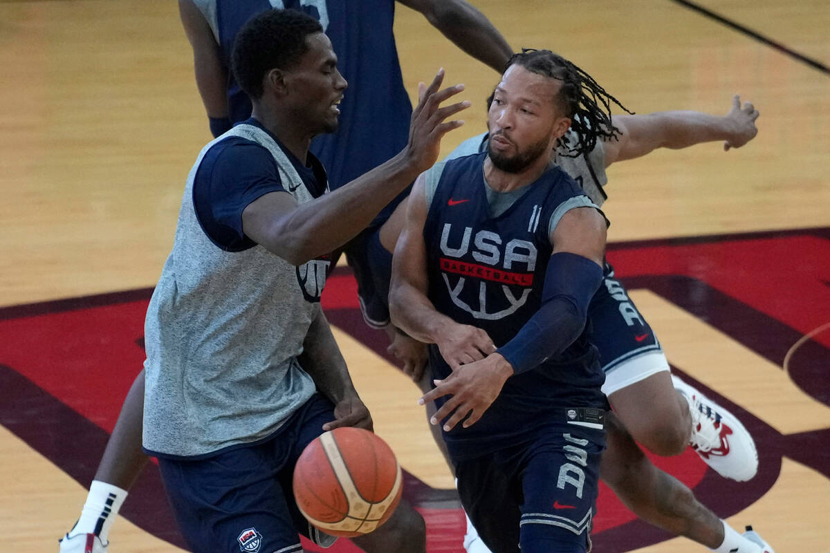 Jalen Brunson of the New York Knicks, right, passes during training camp for the United States ...