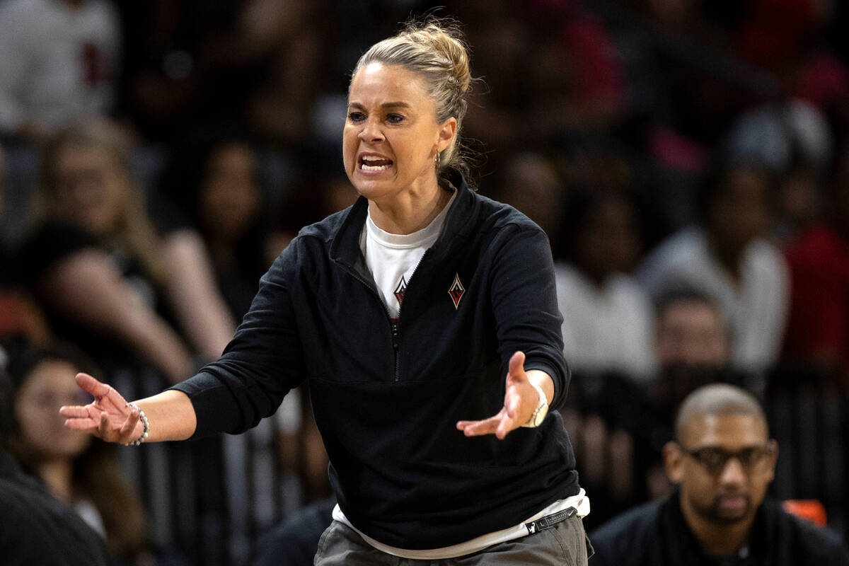 FILE - Las Vegas Aces head coach Becky Hammon shouts from the sidelines during the second half ...
