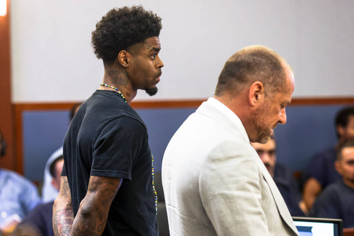 Former Raiders player Damon Arnette, left, appears in court with his attorney Ross Goodman, rig ...