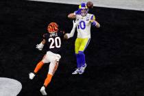 Los Angeles Rams wide receiver Cooper Kupp (10) scores a touchdown in front of Cincinnati Benga ...