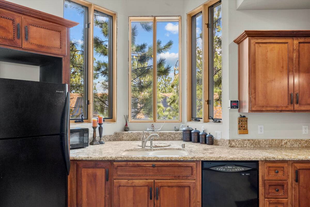 The kitchen window looks into the pine forest. (AVIA Media Group)