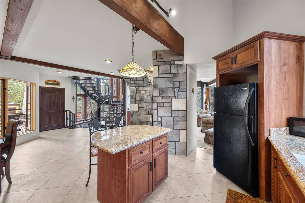 The entrance leads into the living area and kitchen. (AVIA Media Group)