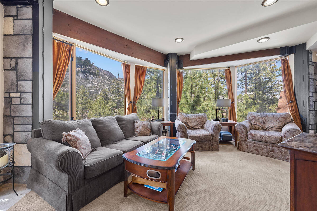 The living area features large picture windows to showcase the Toiyabe National Forest. (AVIA M ...
