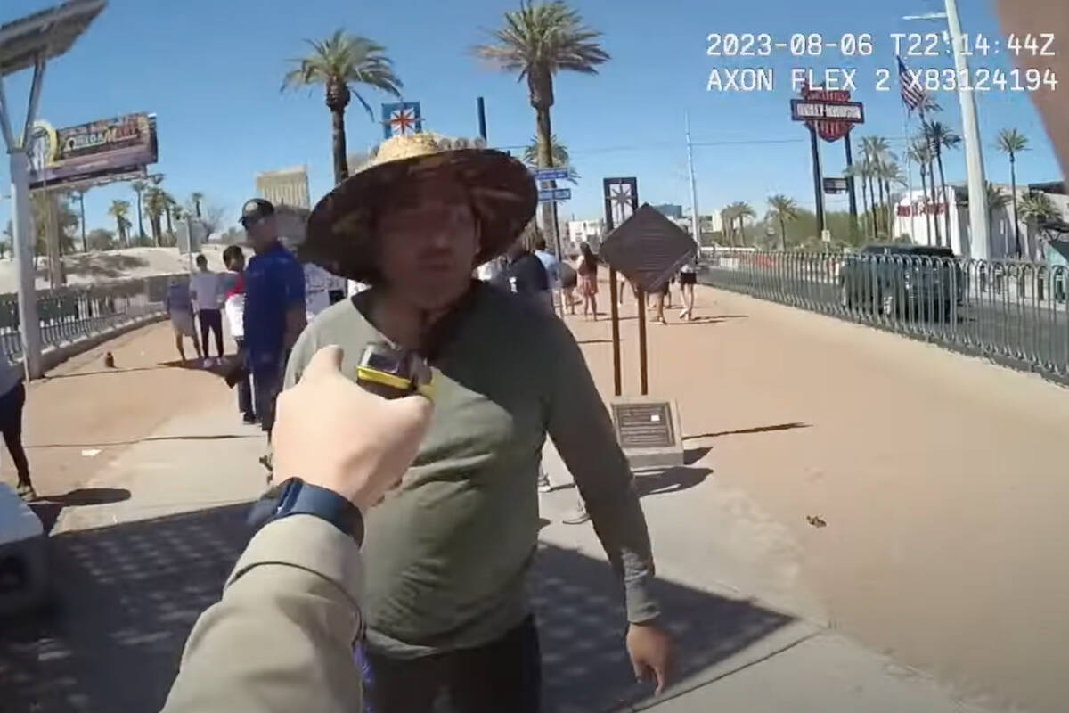 This screen capture from bodycam video released Monday, Aug. 7, 2023, shows a Metropolitan Poli ...