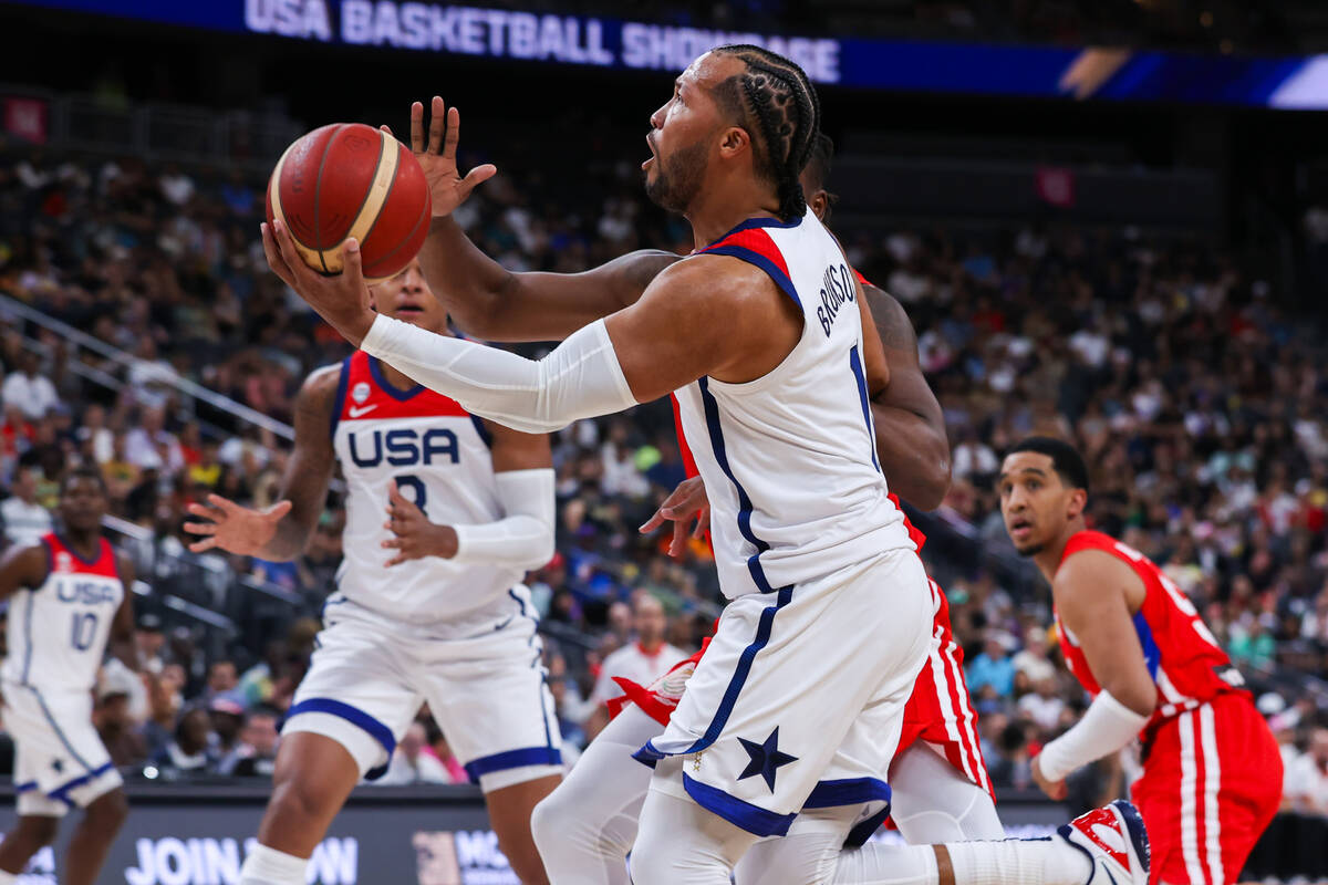USA Basketball Men’s National Team guard Jalen Brunson (11) goes in for a layup at the f ...