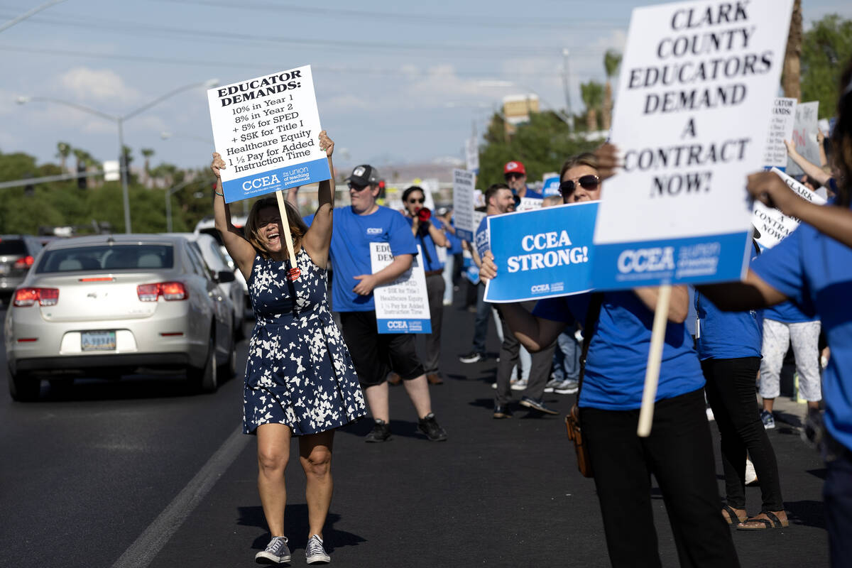 Clark County Education Association teachers union members protest outside CCSD’s Greer E ...